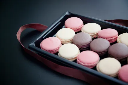 assorted colorful macarons with creamy filling in Windsor